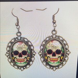 Black and Gold Skull Earrings with Intricate Design